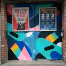 Close-up of the Leadmill doors painted with colourful abstract shapes